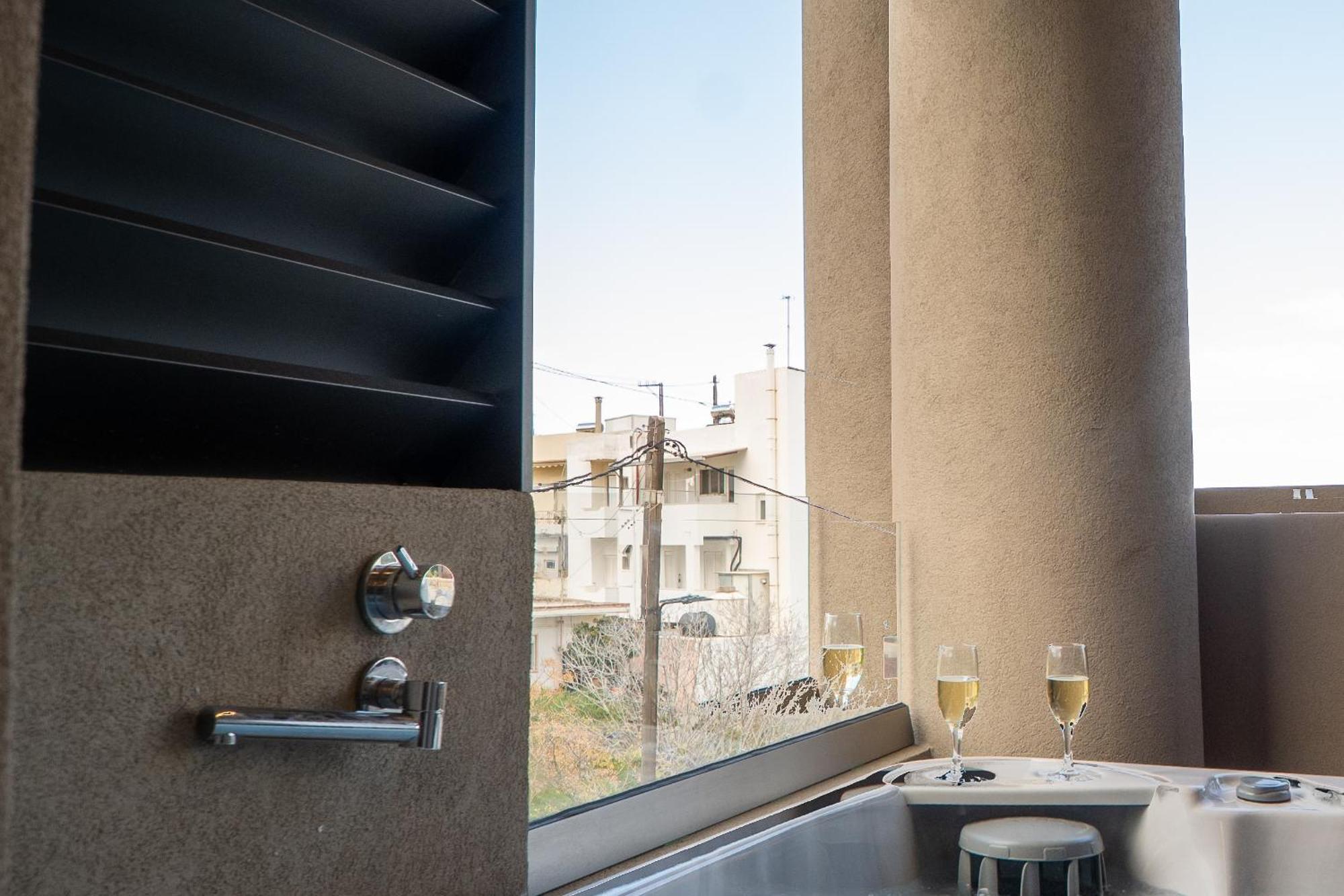 Eros Luxury Suites 罗希姆诺 外观 照片